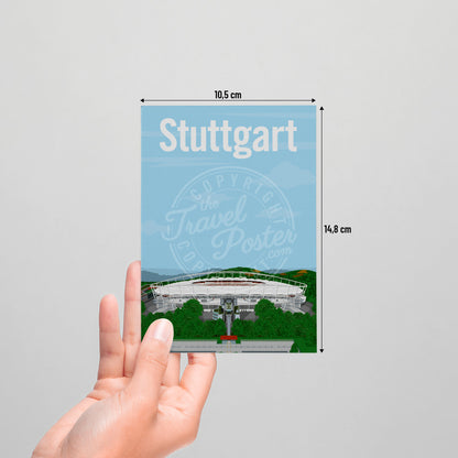 A hand holding a postcard of the Stuttgart Neckarstadion on a white background.