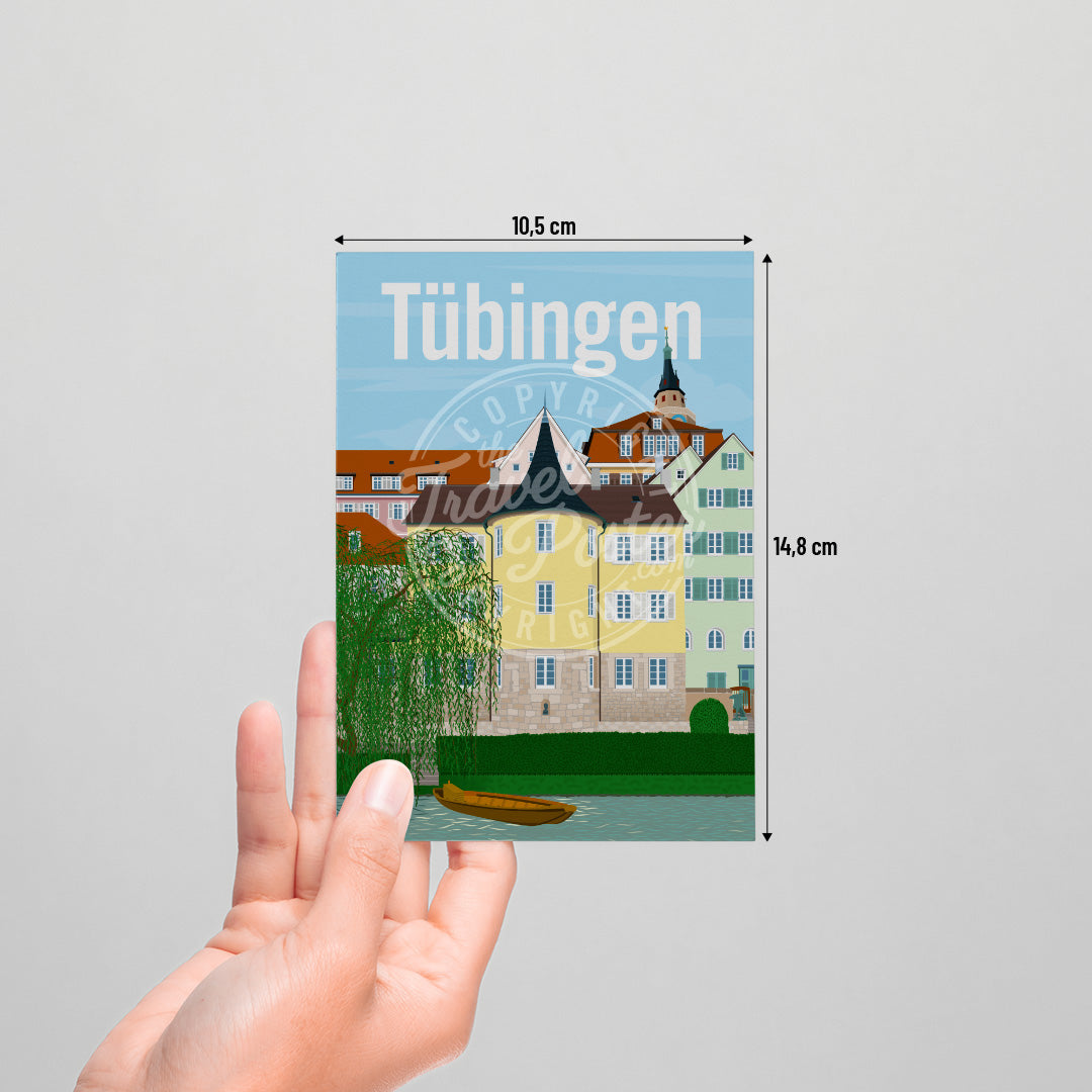 A hand holding a postcard of the Tübingen Holderlinturm on a white background.